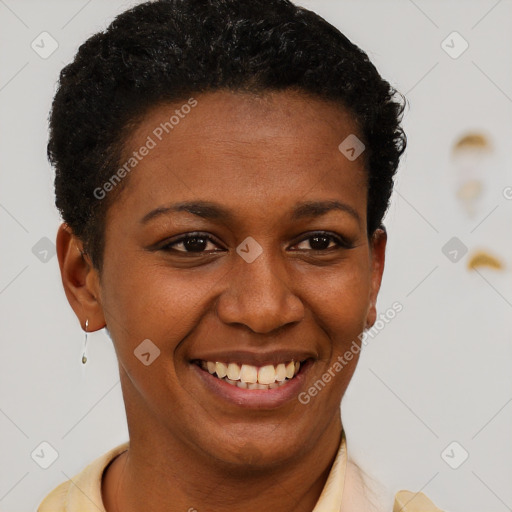 Joyful black young-adult female with short  brown hair and brown eyes