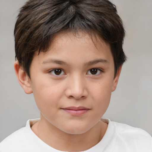 Joyful white child female with short  brown hair and brown eyes