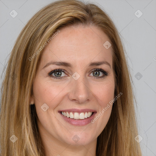 Joyful white young-adult female with long  brown hair and green eyes