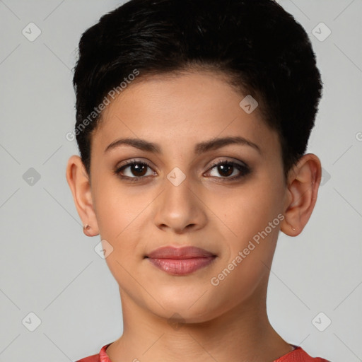 Joyful latino young-adult female with short  brown hair and brown eyes