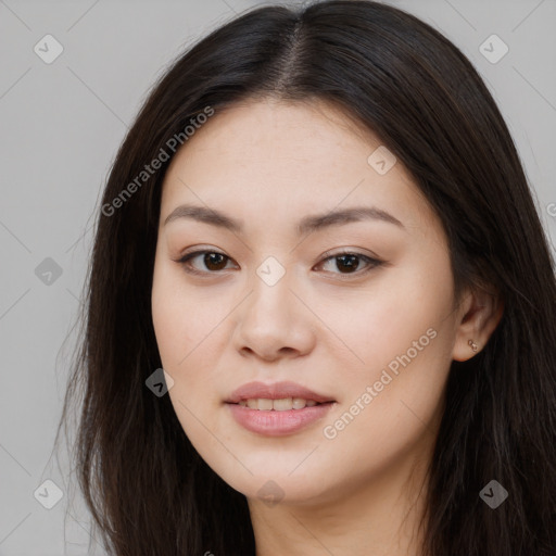 Joyful asian young-adult female with long  brown hair and brown eyes