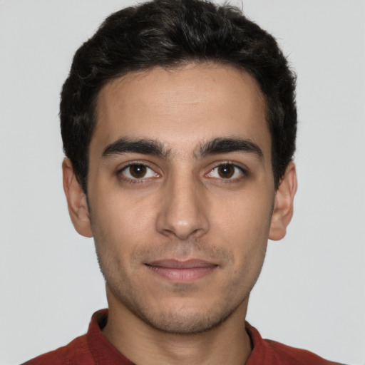Neutral white young-adult male with short  black hair and brown eyes