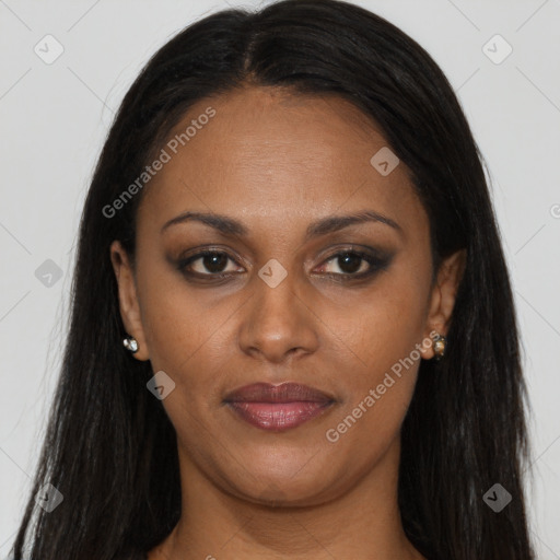 Joyful black young-adult female with long  brown hair and brown eyes