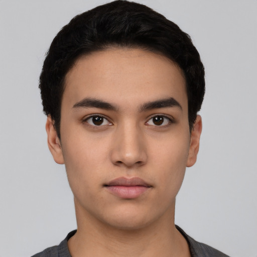 Neutral latino young-adult male with short  black hair and brown eyes