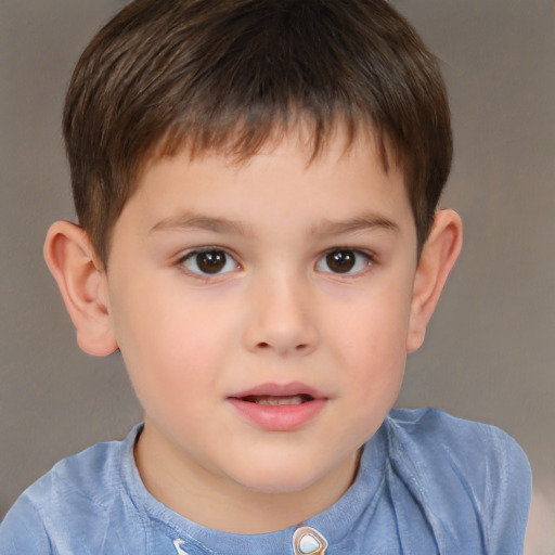 Joyful white child male with short  brown hair and brown eyes