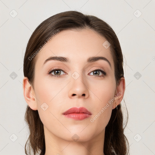 Neutral white young-adult female with long  brown hair and brown eyes