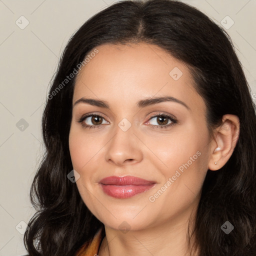 Joyful white young-adult female with long  black hair and brown eyes