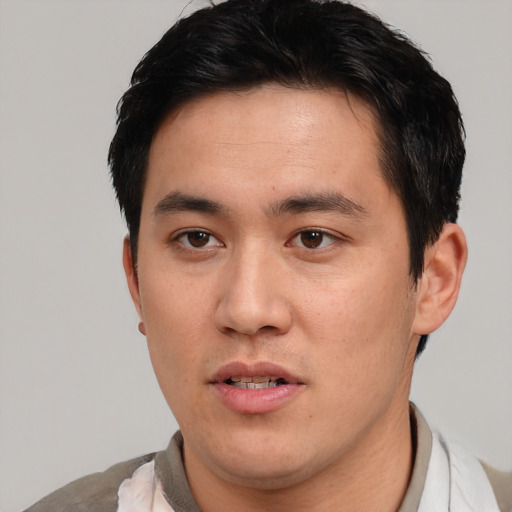 Neutral asian young-adult male with short  black hair and brown eyes