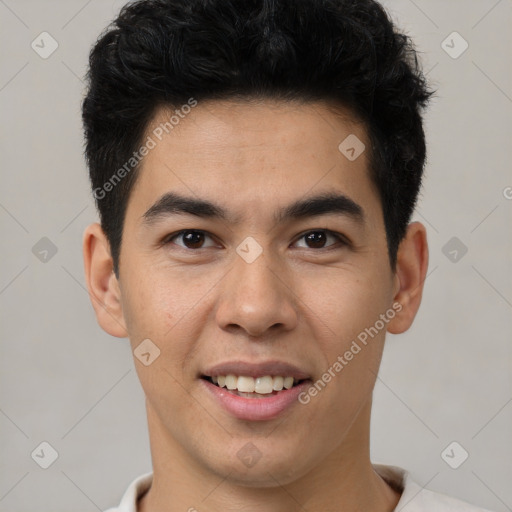 Joyful latino young-adult male with short  brown hair and brown eyes