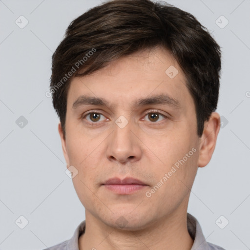 Neutral white young-adult male with short  brown hair and brown eyes