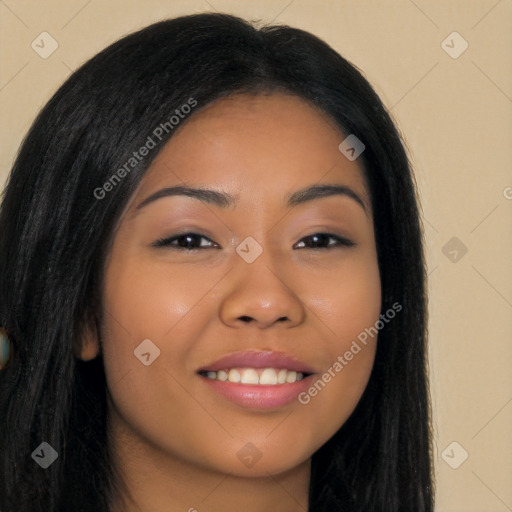 Joyful latino young-adult female with long  black hair and brown eyes