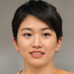 Joyful asian young-adult female with short  brown hair and brown eyes