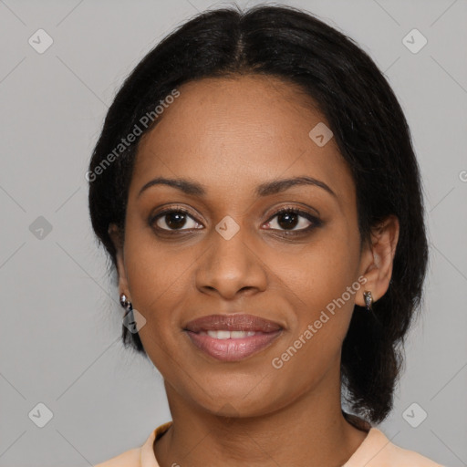 Joyful black young-adult female with medium  black hair and brown eyes