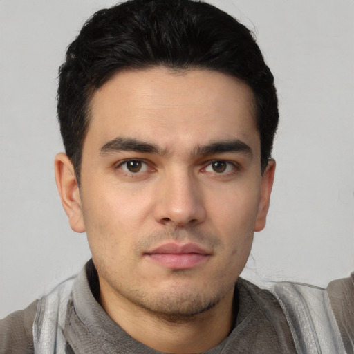 Neutral white young-adult male with short  black hair and brown eyes