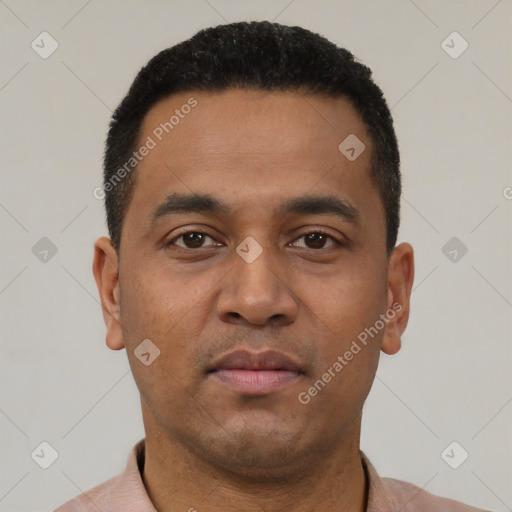 Neutral latino young-adult male with short  black hair and brown eyes