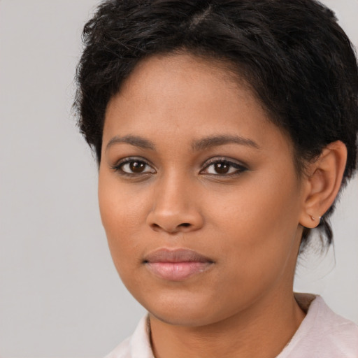 Neutral latino young-adult female with short  brown hair and brown eyes
