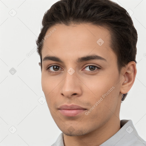 Neutral white young-adult male with short  brown hair and brown eyes