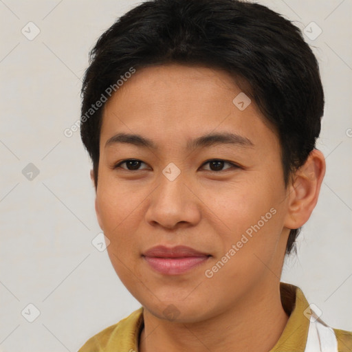 Joyful asian young-adult female with short  brown hair and brown eyes