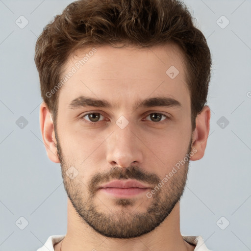 Neutral white young-adult male with short  brown hair and brown eyes