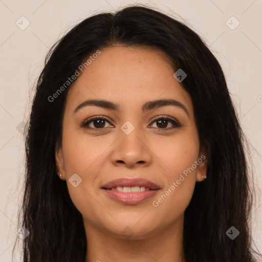 Joyful latino young-adult female with long  brown hair and brown eyes