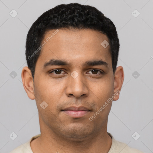 Neutral latino young-adult male with short  black hair and brown eyes