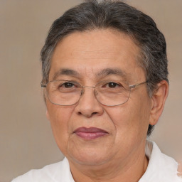 Joyful white middle-aged female with short  brown hair and brown eyes