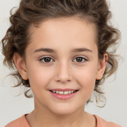 Joyful white child female with medium  brown hair and brown eyes