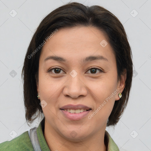 Joyful white young-adult female with medium  brown hair and brown eyes