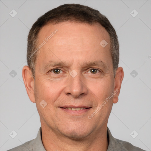 Joyful white adult male with short  brown hair and brown eyes