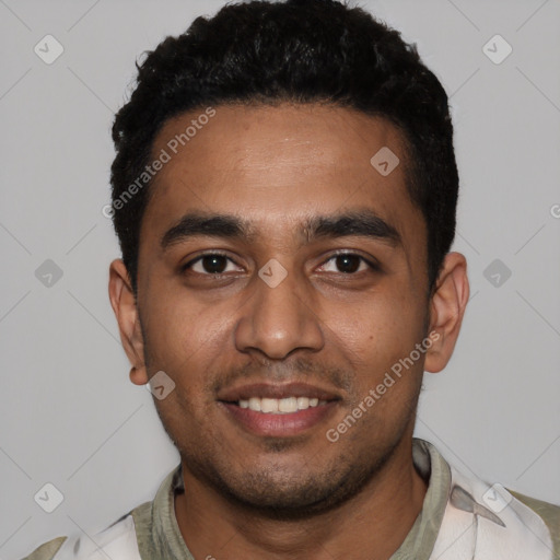 Joyful latino young-adult male with short  black hair and brown eyes