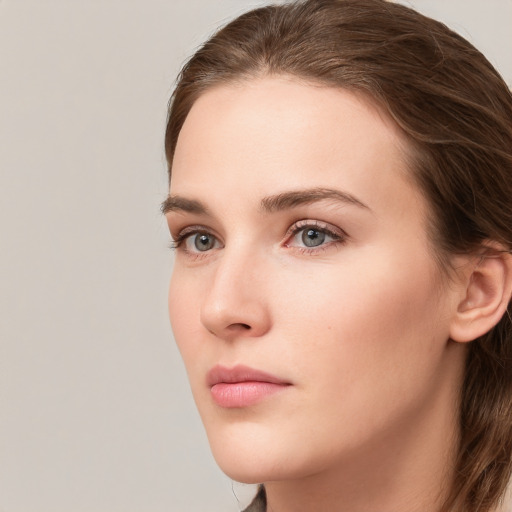 Neutral white young-adult female with long  brown hair and grey eyes