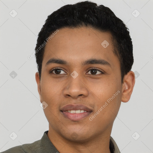 Joyful latino young-adult male with short  black hair and brown eyes