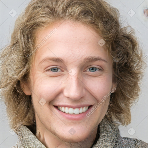 Joyful white young-adult female with medium  brown hair and blue eyes