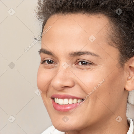 Joyful white young-adult female with short  brown hair and brown eyes