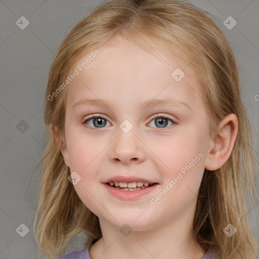 Joyful white child female with medium  brown hair and blue eyes