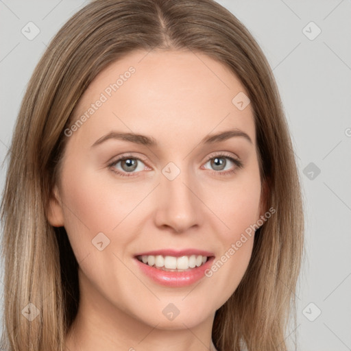 Joyful white young-adult female with long  brown hair and green eyes