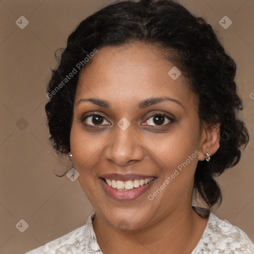 Joyful black young-adult female with medium  brown hair and brown eyes