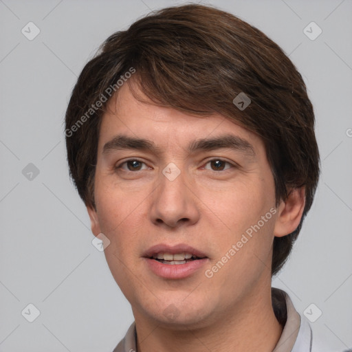 Joyful white young-adult male with medium  brown hair and brown eyes