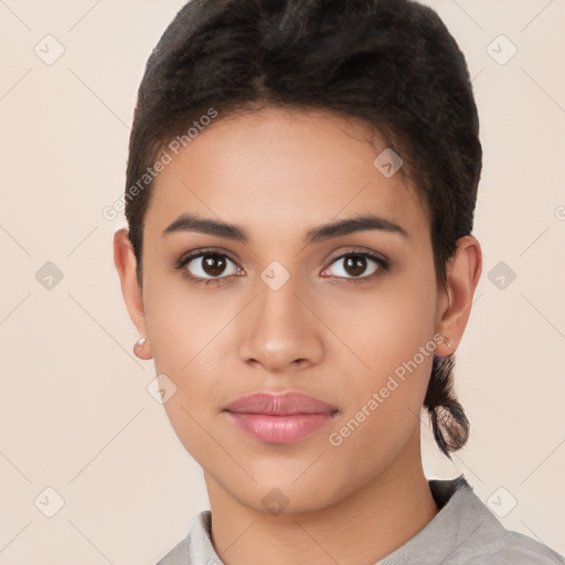 Joyful latino young-adult female with short  black hair and brown eyes