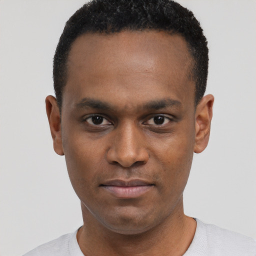 Neutral black young-adult male with short  black hair and brown eyes