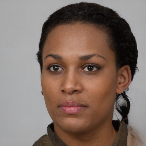 Neutral black young-adult female with short  black hair and brown eyes
