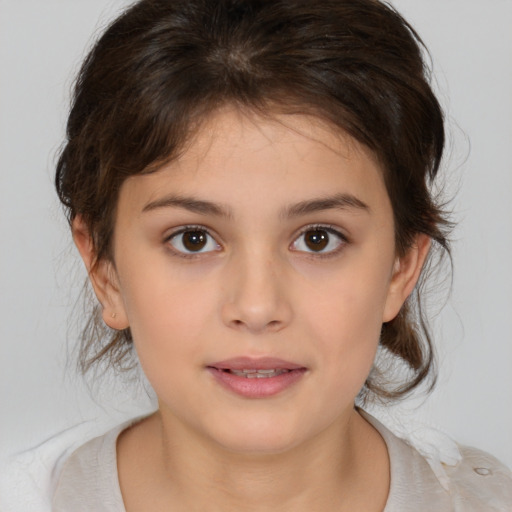 Joyful white child female with medium  brown hair and brown eyes