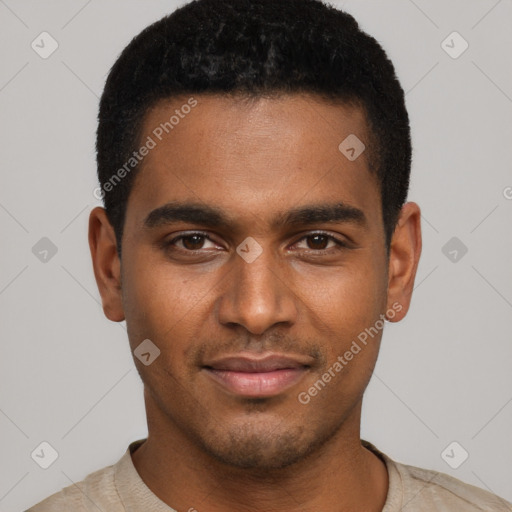 Joyful black young-adult male with short  brown hair and brown eyes