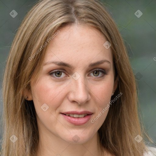 Joyful white young-adult female with long  brown hair and green eyes