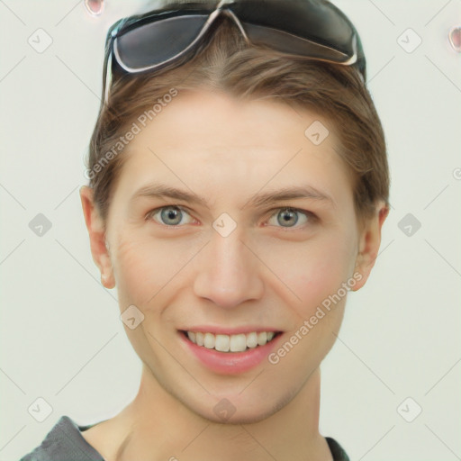 Joyful white young-adult female with short  brown hair and grey eyes