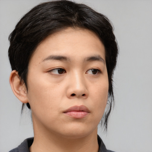Neutral asian young-adult female with medium  brown hair and brown eyes