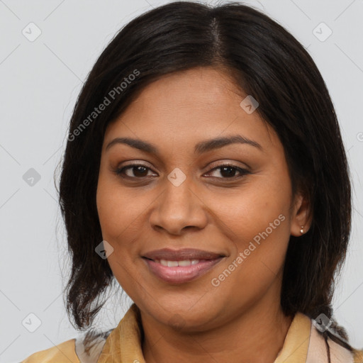 Joyful latino young-adult female with medium  brown hair and brown eyes