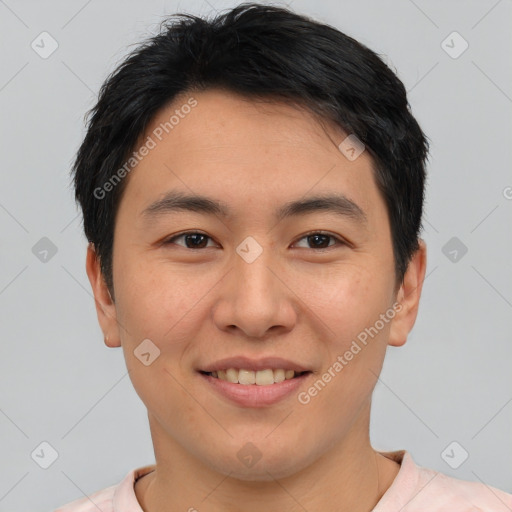 Joyful asian young-adult male with short  brown hair and brown eyes