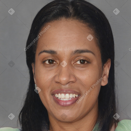 Joyful black adult female with medium  brown hair and brown eyes