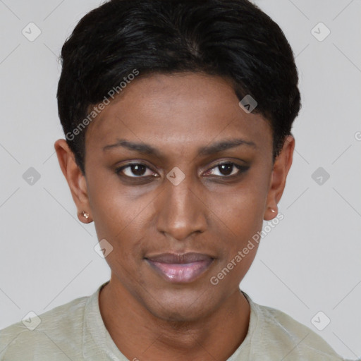 Joyful black young-adult female with short  brown hair and brown eyes
